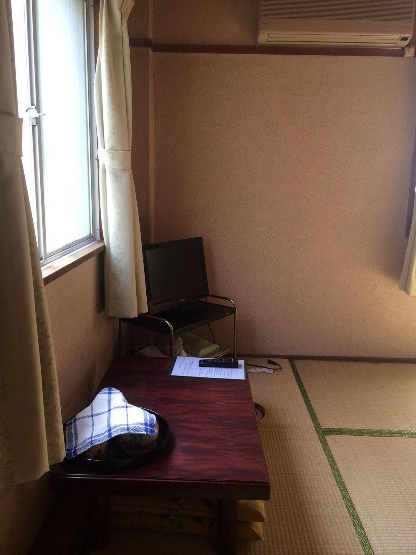 Kasuga Ryokan Хиросима Экстерьер фото