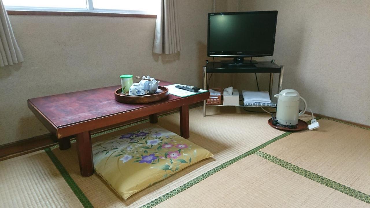Kasuga Ryokan Хиросима Экстерьер фото