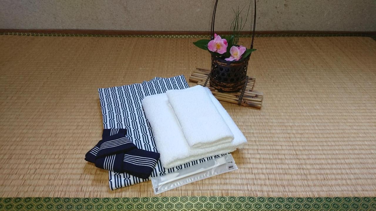 Kasuga Ryokan Хиросима Экстерьер фото